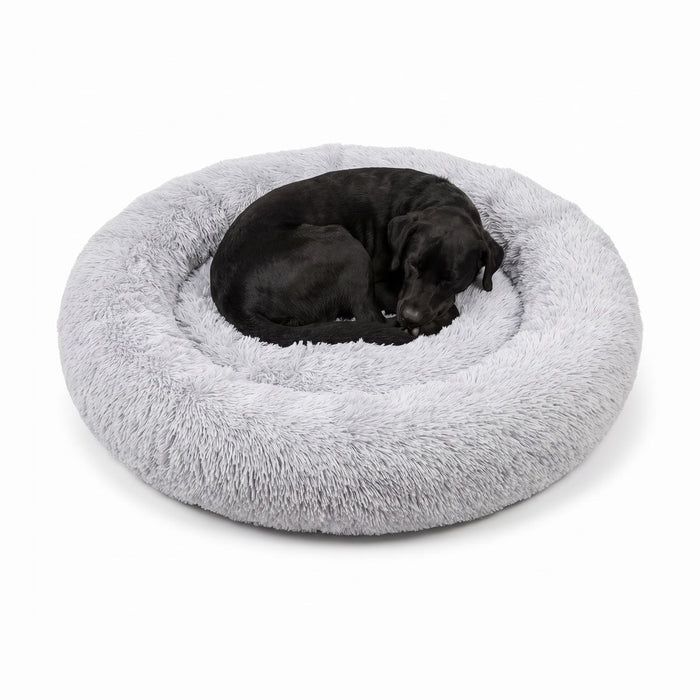 Labrador som sover i en ljusgrå CalmBed i storlek XL